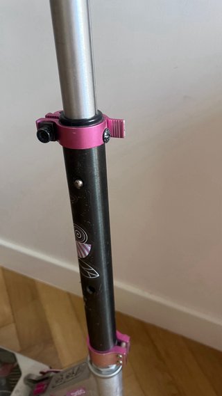 Patinete Decathlon rosa y plateado