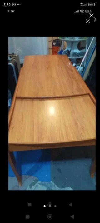 Mesa de comedor extensible de madera