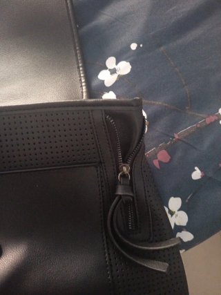Mochila Negra Perforada