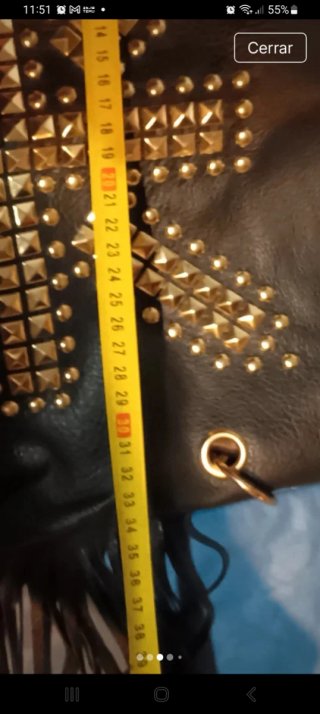 Bolso bandolera rock, punk de piel con tachuelas