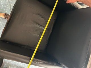 Sillón de peluquería de cuero negro