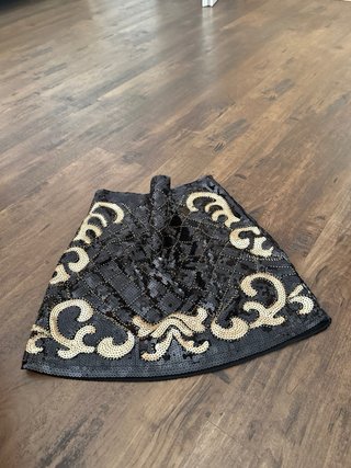 Falda corta lentejuelas negra y dorada ZARA