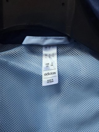 Chaqueta Real Madrid con capota Adidas Azul Naranj