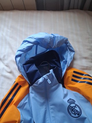 Chaqueta Real Madrid con capota Adidas Azul Naranj