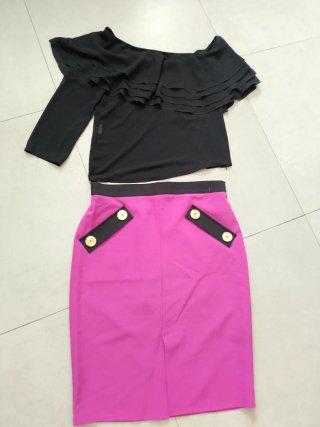 Top negro elegante con volantes