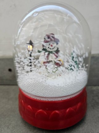 Bola de nieve Navidad con luz y música
