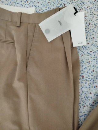 Traje de chaqueta y pantalón beige