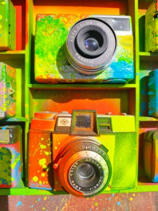 Quadro decorativo con fotocamere analogiche e carrelli