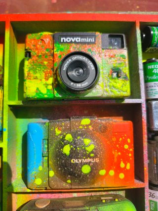 Quadro decorativo con fotocamere analogiche e carrelli