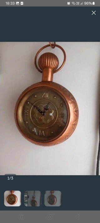 Orologio da parete antico in rame