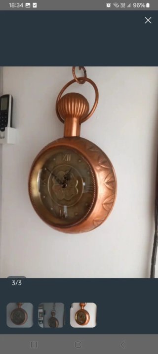 Orologio da parete antico in rame