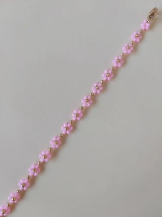 Pulsera de Verano. Flores rosa y dorado.