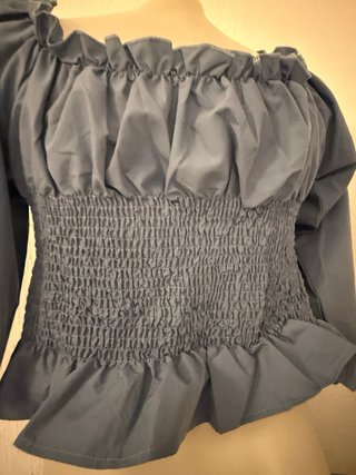 Blusa elegante con cordones