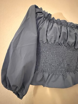 Blusa elegante con cordones