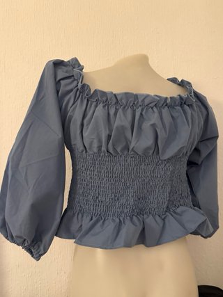 Blusa elegante con cordones