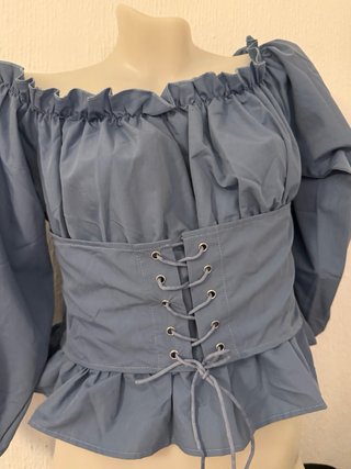 Blusa elegante con cordones
