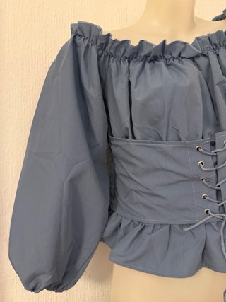 Blusa elegante con cordones