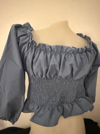 Blusa elegante con cordones