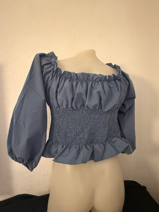 Blusa elegante con cordones