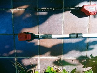 Cortasetos y motosierra telescópica Einhell