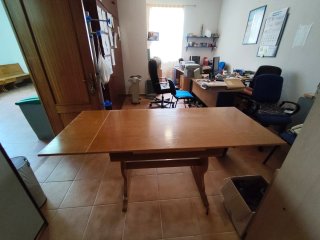 Mesa de comedor ampliable de madera