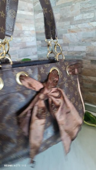 Borsa Louis Vuitton marrone con fiocco