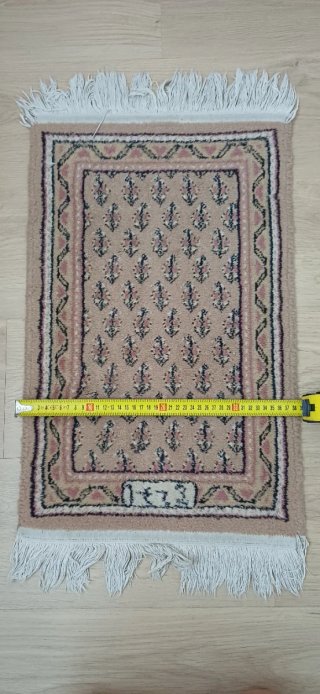 2 Alfombras pequeñas beige y rosa