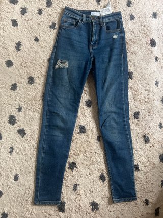 Pantalones vaqueros desgastados azules