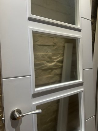 Puerta doble blanca con cristal