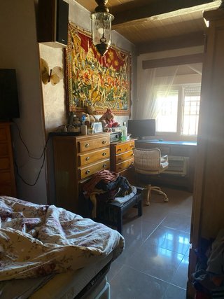 Parcela de terreno co casa