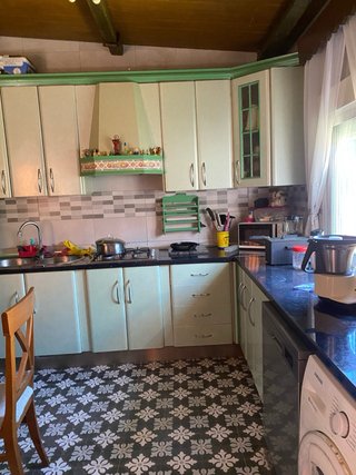 Parcela de terreno co casa