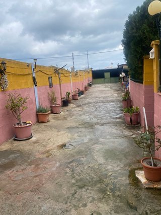 Parcela de terreno co casa