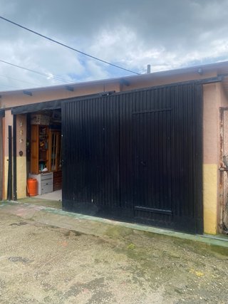 Parcela de terreno co casa