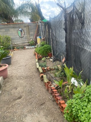 Parcela de terreno co casa