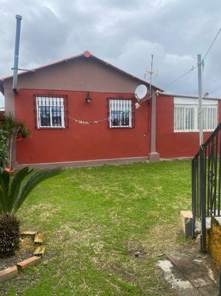 Parcela de terreno co casa