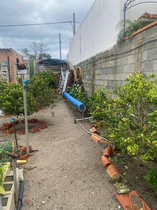 Parcela de terreno co casa