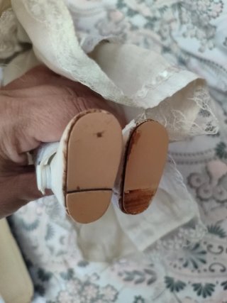 Muñeca porcelana vintage peinado peculiar