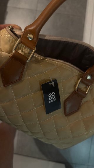 Bolso  beige  y mono negro largo talla L bershka