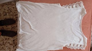 Blusa de encaje sin mangas