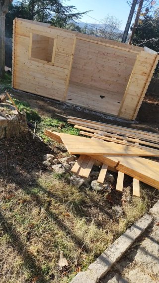 Casa de madera desmontable para jardín