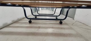 Cama plegable con ruedas