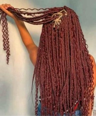 Trenzas africanas y uñas