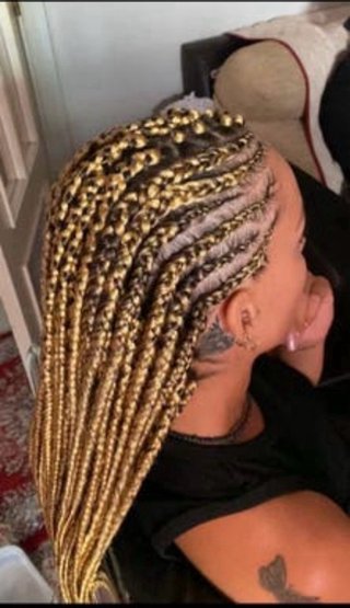 Trenzas africanas y uñas