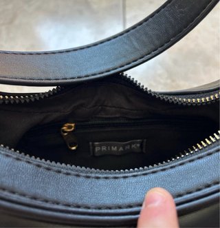 Bolso negro acolchado