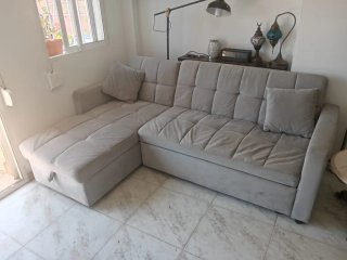 Sofá cama con arcón gris