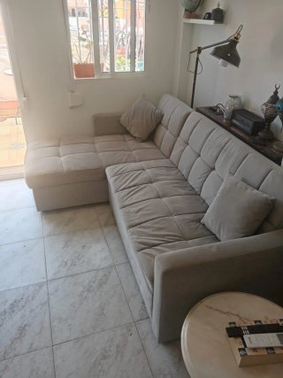 Sofá cama con arcón gris