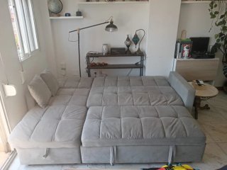 Sofá cama con arcón gris