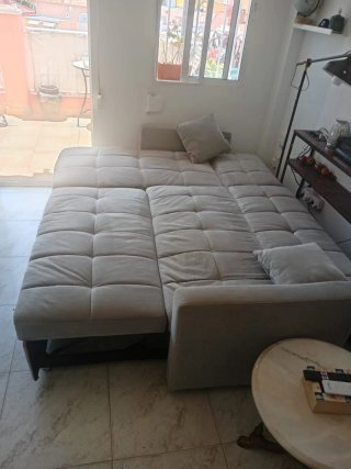 Sofá cama con arcón gris