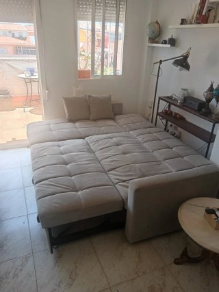 Sofá cama con arcón gris