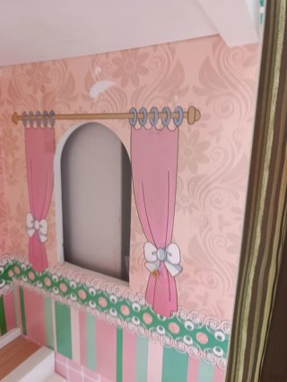 Casita de muñecas de madera